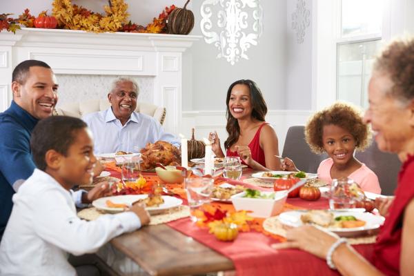 family enjoying Thanksgiving dinner