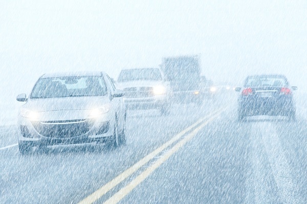 Car Driving on Highway in Winter Weather