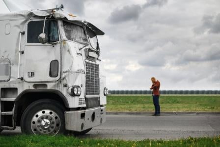 man on phone after truck accident