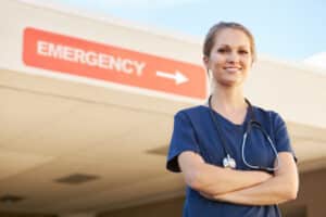 Portrait Of Female Doctor Standing Outside Hospital Emergency