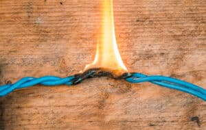 Electrical cord on fire due to defective design